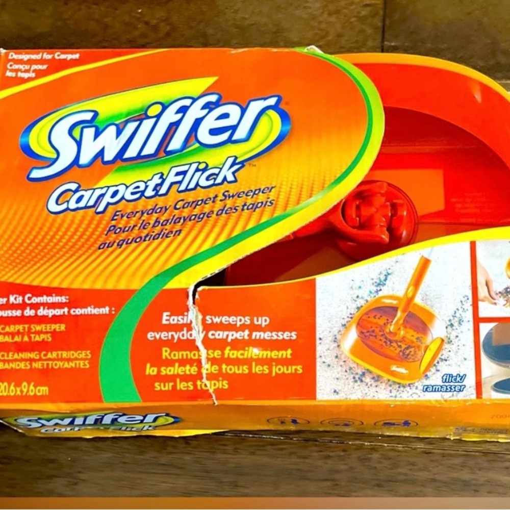 Swiffer Carpet Flick with Orange and Yellow Design